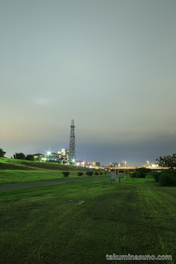 Nightscape at Riverside of Tama River with Transmission Tower